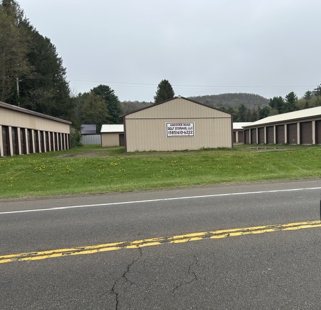 Storage facility sign and buildings seen from Andover Rd. in Wellsville, NY